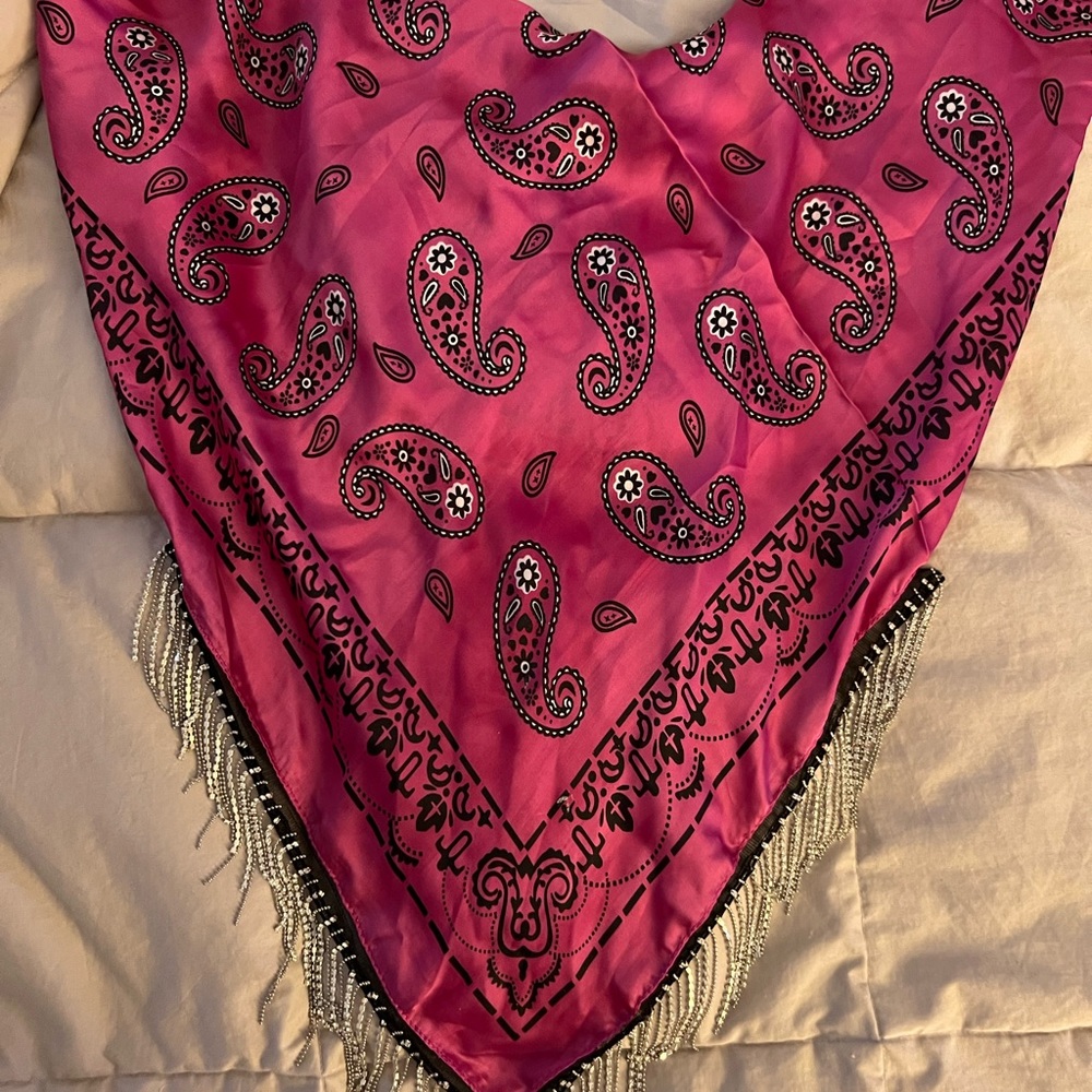 Beautiful pink silk scarf with rhinestones. It’s perfect for a Nashville trip!